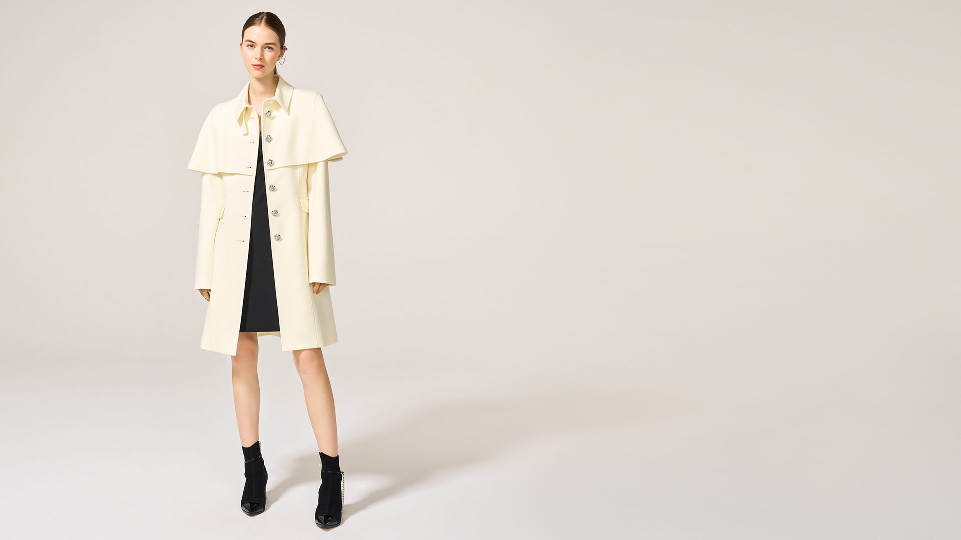 Ivory Cape Coat: hero banner